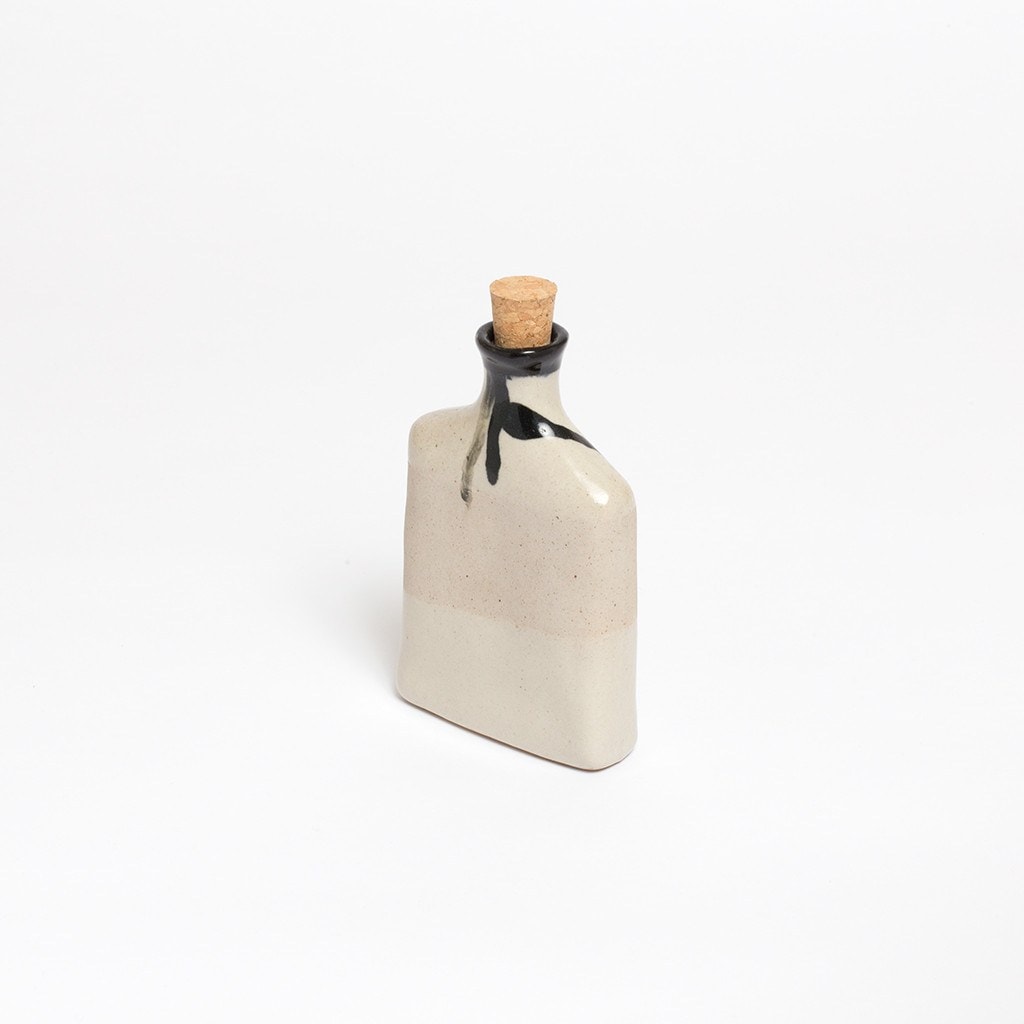 Claymen ceramic flask with dripping glaze